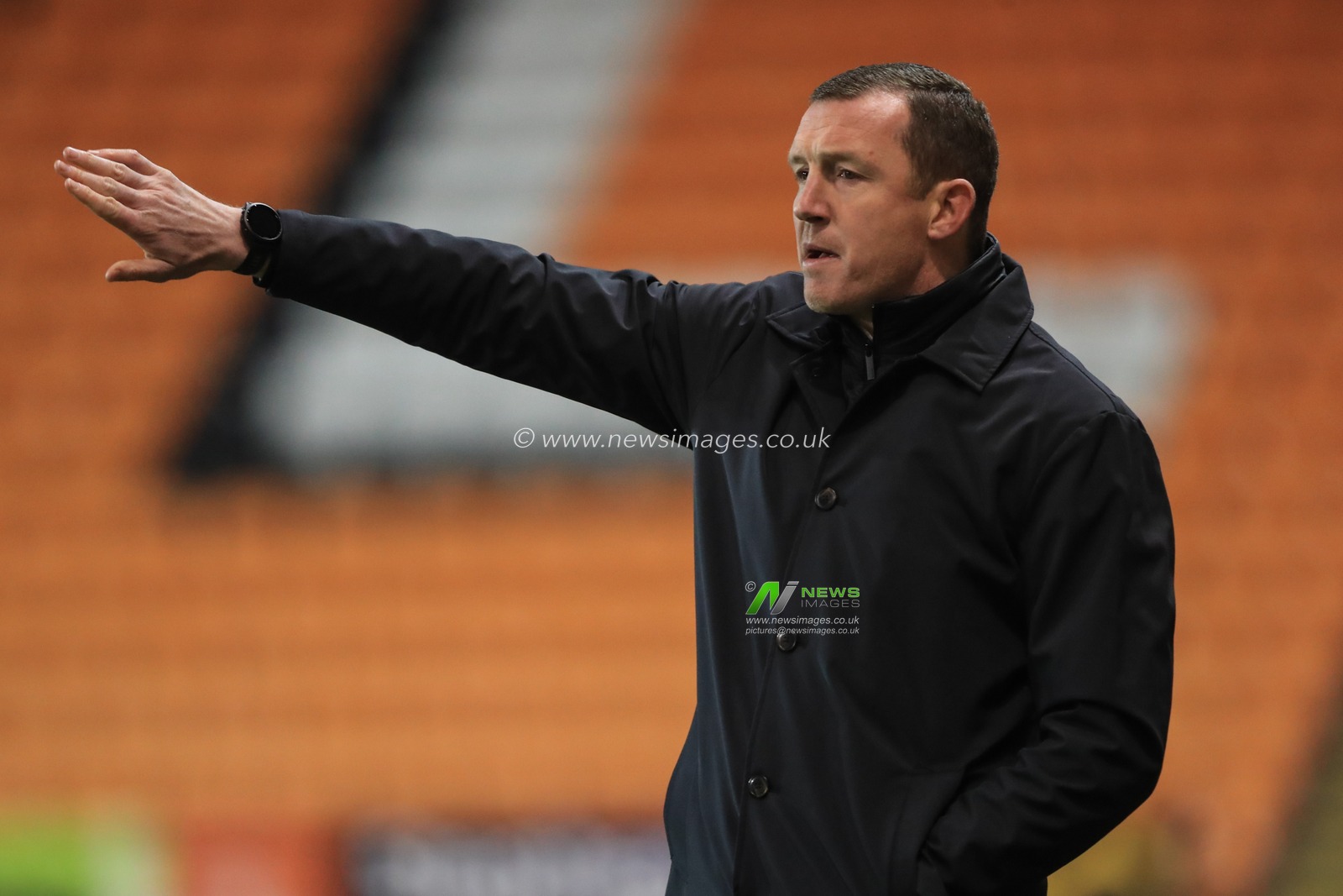 Neill Collins Head coach of Barnsley gives his team instructions during the Bristol Street Motors Trophy match Blackpool vs Barnsley at Bloomfield Road, Blackpool, United Kingdom, 5th December 2023

(Photo by Alfie Cosgrove/News Images)