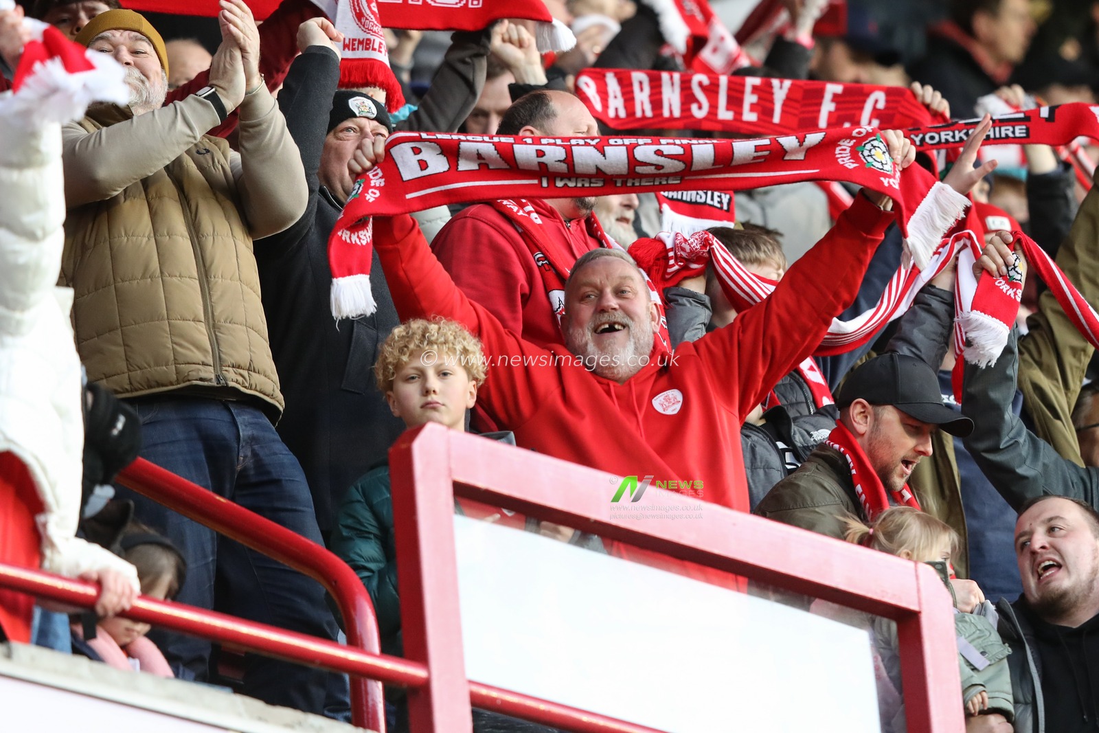 Barnsley fans celebrate a 2-1 win during the Sky Bet League 1 match Barnsley vs Derby County at Oakwell, Barnsley, United Kingdom, 24th February 2024

(Photo by Alfie Cosgrove/News Images)