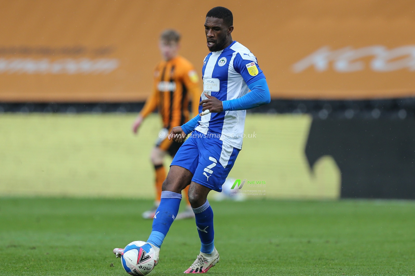 Tendayi Darikwa #2 of Wigan Athletic passes the ball