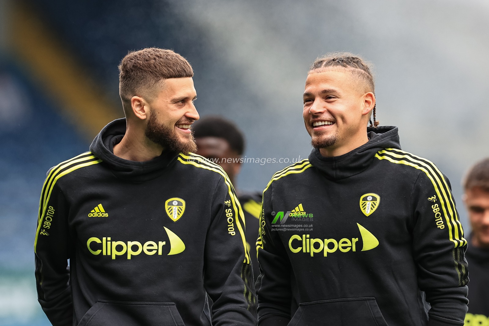 Mateusz Klich #43 of Leeds United and Kalvin Phillips #23 of Leeds United having a bit of banter as they walk the pitch before kick-off