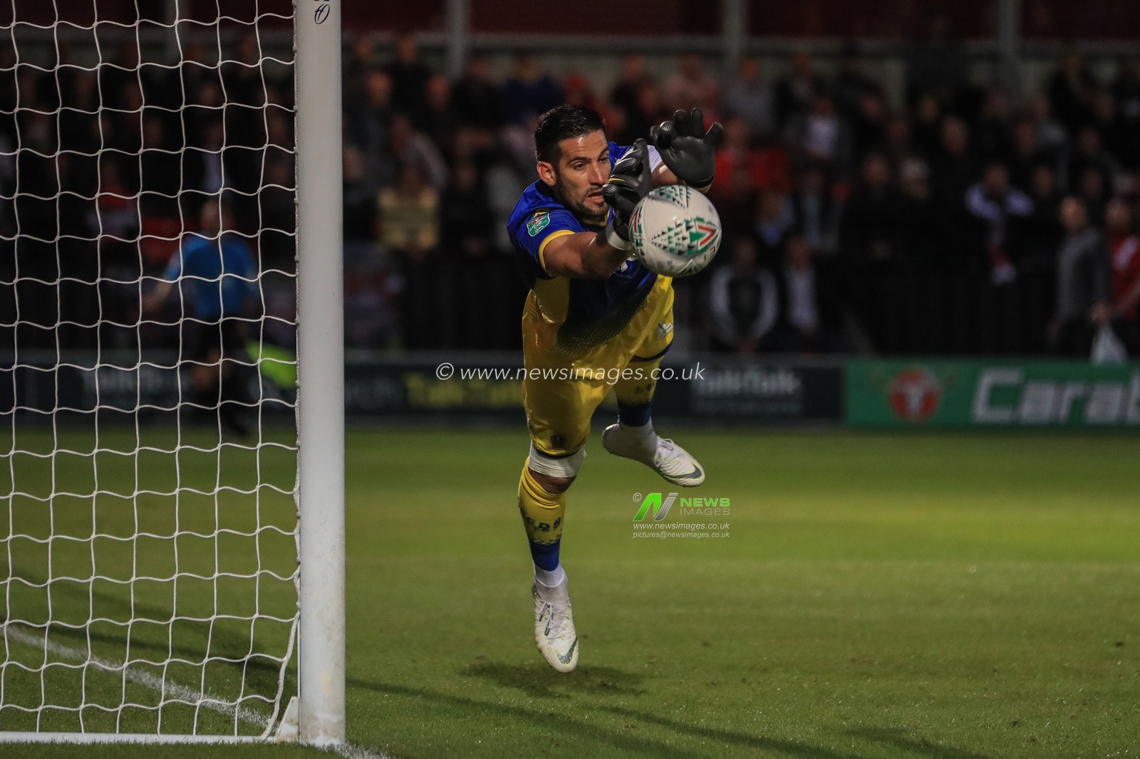 13th August 2019, Moor Lane, Salford, England; Carabao Cup, Round 1,  Salford City vs Leeds United ; Kiko Casilla (13) of Leeds United makes a save from Richie Towell (17) of Salford Cityâ€™s free-kick


Credit: Mark Cosgrove/News Images

English Football League images are subject to DataCo Licence
