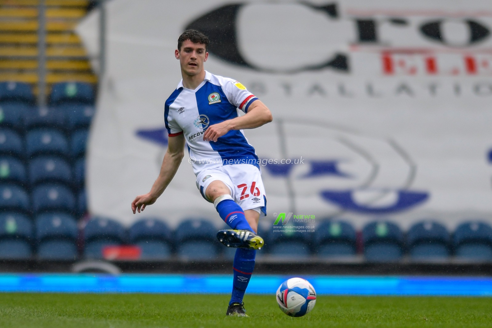 Darragh Lenihan #26 of Blackburn Rovers passes the ball