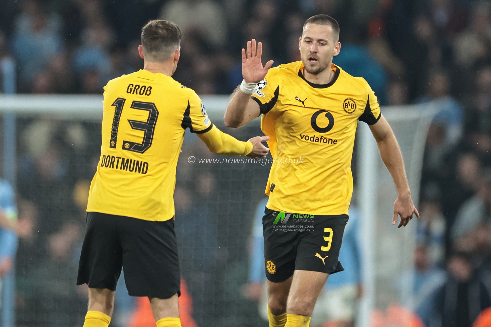 Waldemar Anton of Borussia Dortmund celebrates his goal to make it 3-1 with Pascal Grob of Borussia Dortmund during the UEFA Champions League Matchday 4 of 8 Manchester City vs Borussia Dortmund at the City of Manchester Stadium, Manchester, United Kingdom, 5th November 2025

(Photo by Mark Cosgrove/News Images)

*** GER AUT SUI OUT ***