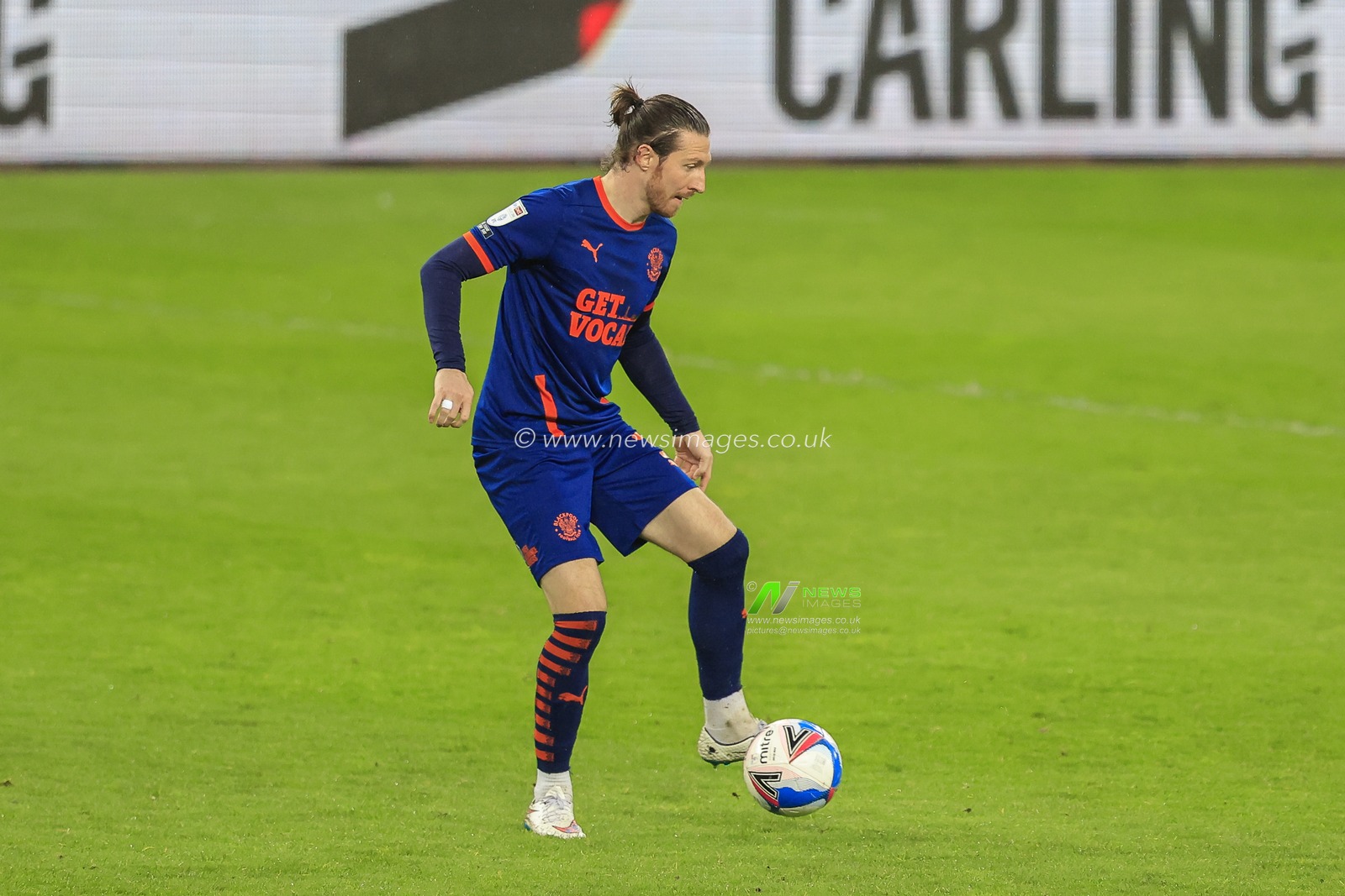 James Husband #3 of Blackpool in possession of the ball
