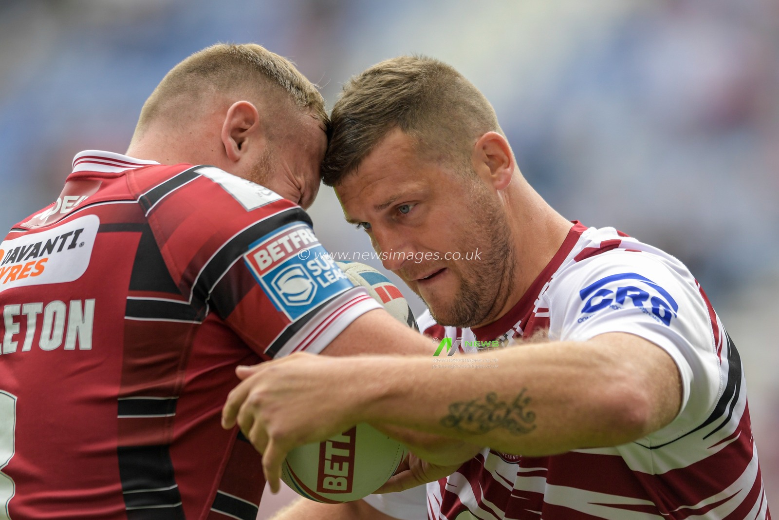Tony Clubb (17) of Wigan Warriors during the warm up with Brad Singleton (8) of Wigan Warriors