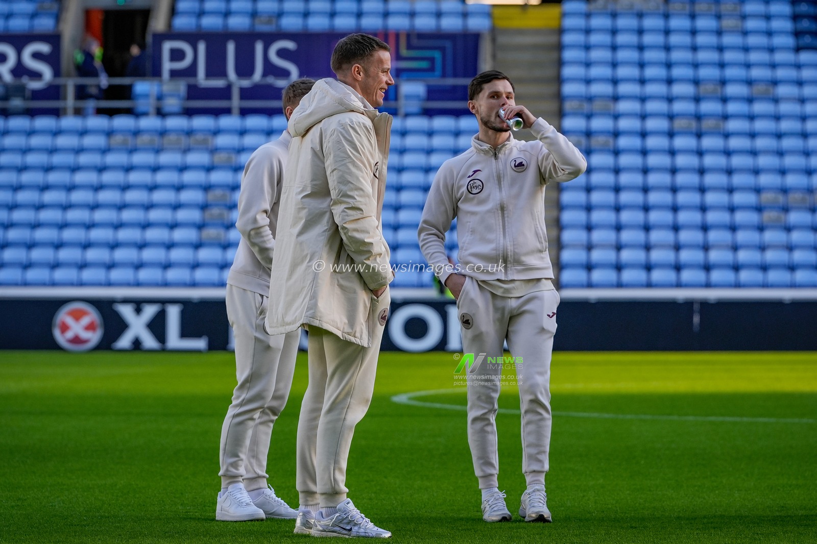 Paul Farman, of Swansea City and Liam Cullen, of Swansea City inspect the pitch during the Sky Bet Championship match Coventry City vs Swansea City at Coventry Building Society Arena, Coventry, United Kingdom, 26th December 2025

(Photo by Maynard Manyowa/News Images)

*** GER AUT SUI OUT ***