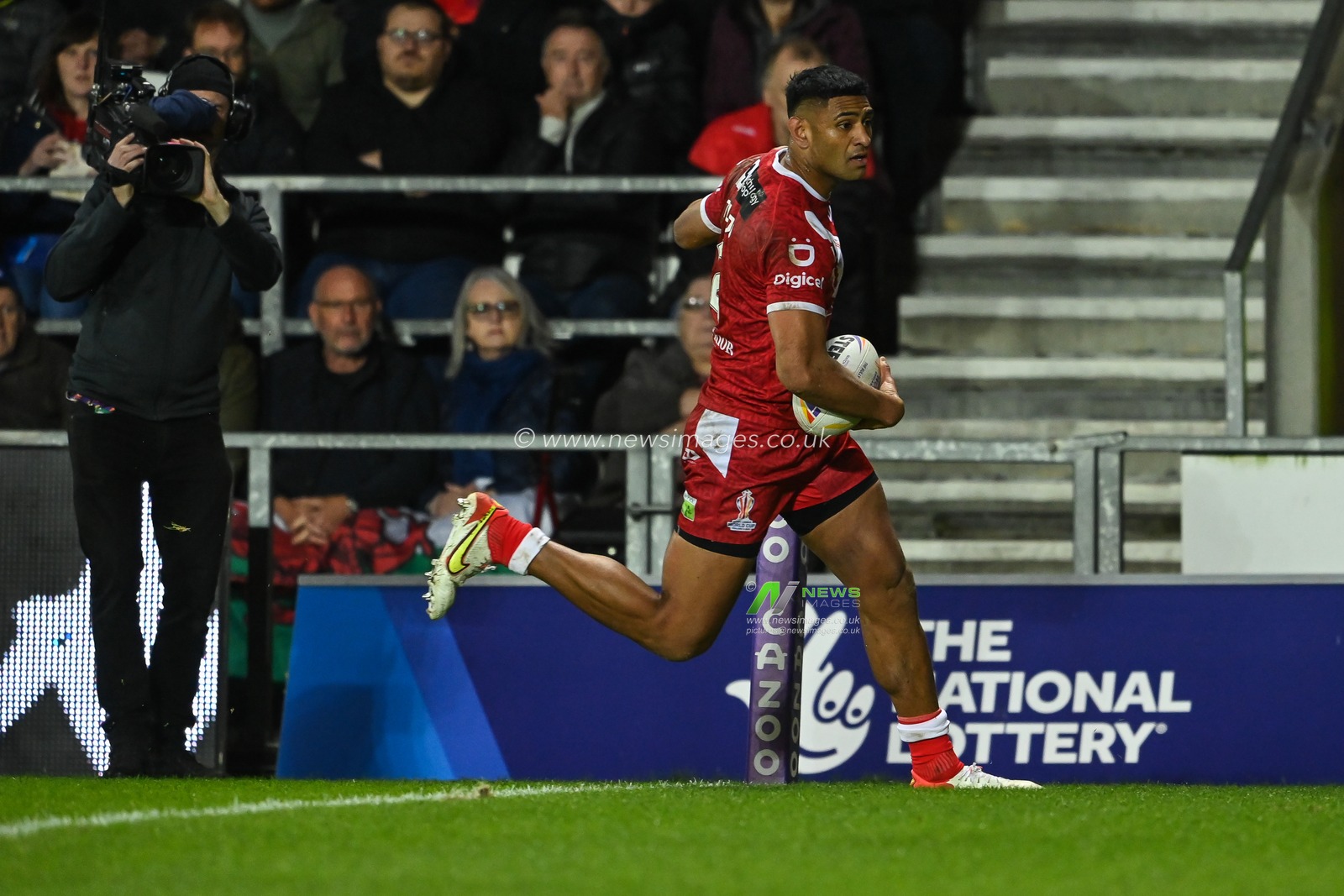 Daniel Tupou of Tonga goes over for a try during the Rugby League World Cup 2021 match Tonga vs Wales at Totally Wicked Stadium, St Helens, United Kingdom, 24th October 2022

(Photo by Craig Thomas/News Images)