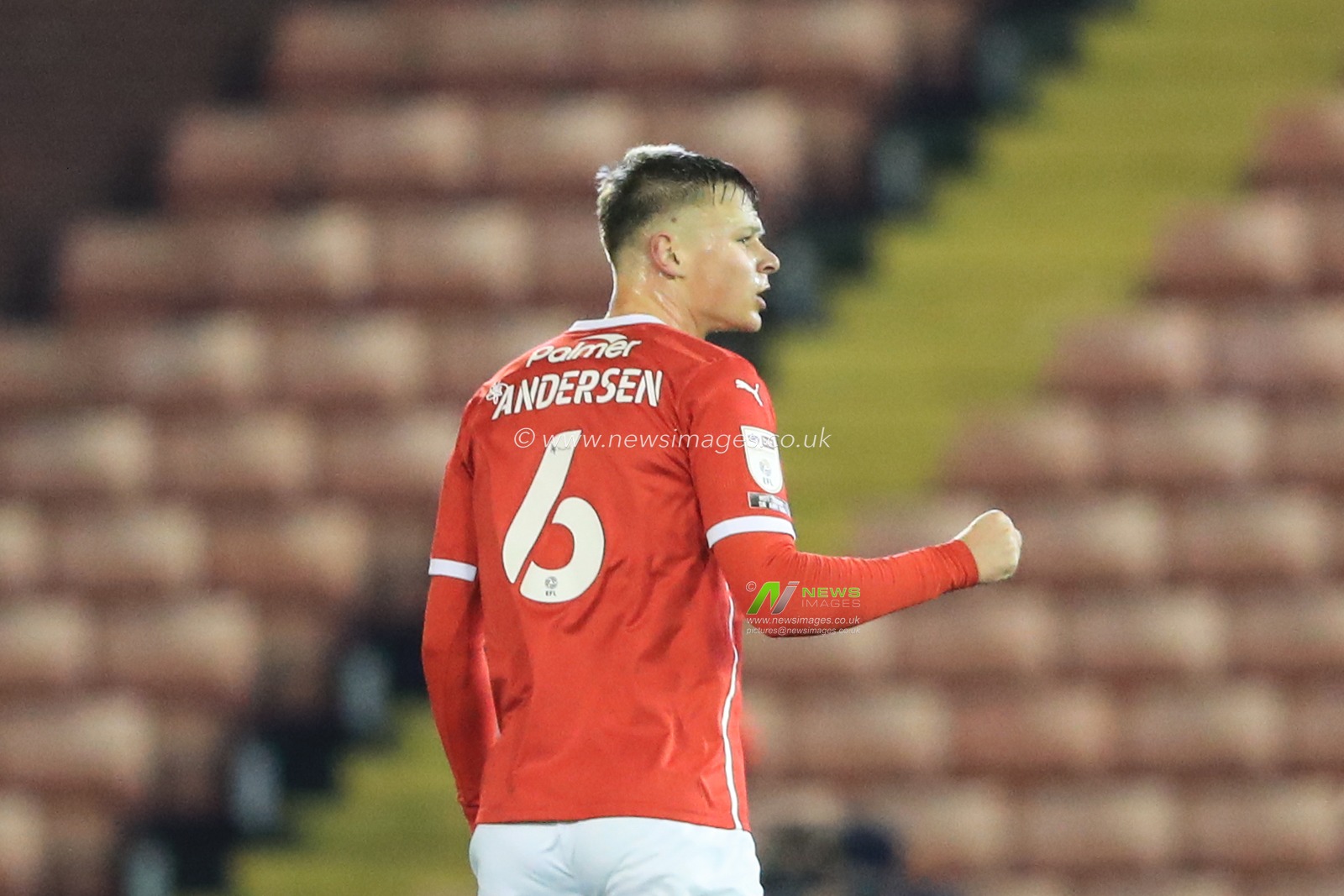 Mads Juel Andersen #6 of Barnsley celebrates Callum Styles #4 of Barnsley goal make it 1-0