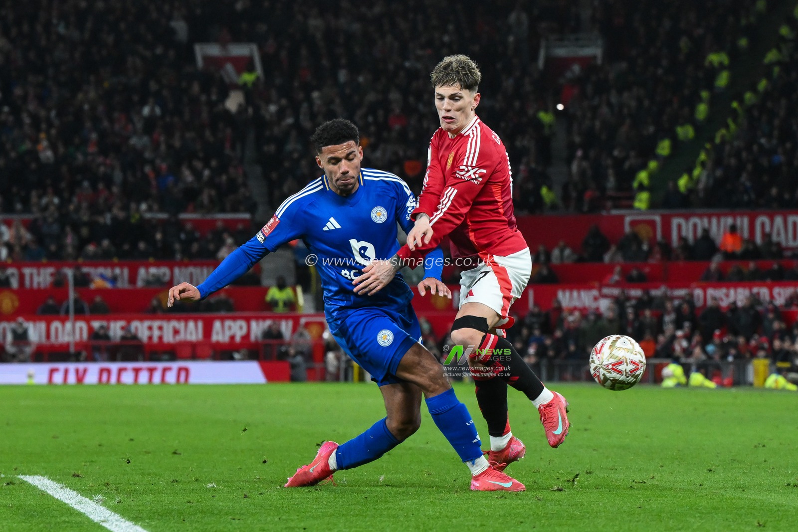 Alejandro Garnacho of Manchester United is tackled by James Justin of Leicester City during the Emirates FA Cup Fourth Round match Manchester United vs Leicester City at Old Trafford, Manchester, United Kingdom, 7th February 2025

(Photo by Craig Thomas/News Images)