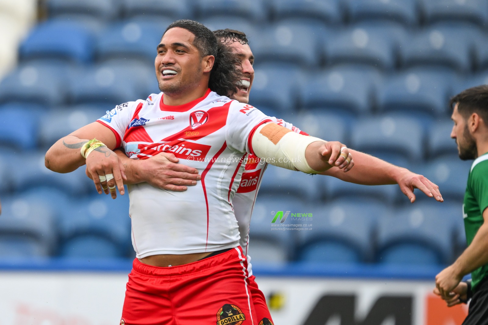 Sione Mataâ€™utia of St. Helens celebrates his try during the Betfred Super League Round 24 match Huddersfield Giants vs St Helens at John Smith's Stadium, Huddersfield, United Kingdom, 1st September 2024

(Photo by Craig Thomas/News Images)