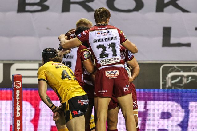 Abbas Miski of Wigan Warriors celebrates his try during the Betfred Super League Round 26 match Wigan Warriors vs Castleford Tigers at The Brick Community Stadium, Wigan, United Kingdom, 12th September 2025

(Photo by Alfie Cosgrove/News Images)