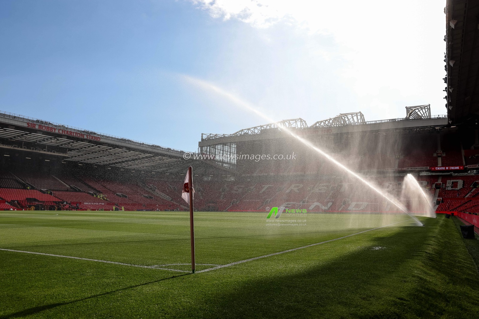 Water sprinklers douse the pitch ahead of kickoff during the Premier League match Manchester United vs Brentford at Old Trafford, Manchester, United Kingdom on 27 April 2026

(Photo by Mark Cosgrove/News Images)