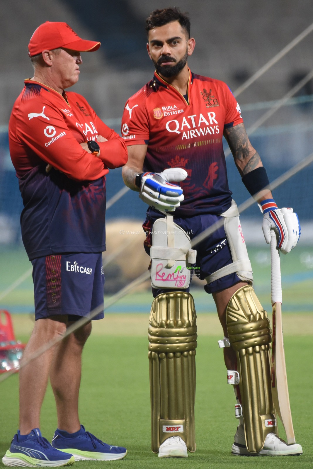 Royal Challengers Bengaluru Virat Kohli  and Head Coach Andy Flower during the training session during the Indian Premier League (IPL) 2025 cricket tournament opening match between Kolkata Knight Riders and Royal Challengers Bengaluru at the Eden Garden Cricket Stadium in Kolkata, India, on March 20, 2025.Pictures by Debajyoti Chakraborty.(Photo: Debajyoti Chakraborty/News Images)