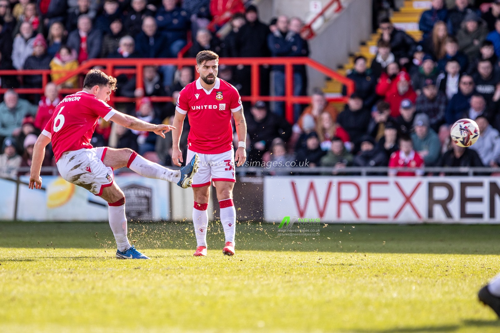 Tom O'Connor of Wrexham AFC takes the final free kick of the game during the Sky Bet League 1 match Wrexham vs Bolton Wanderers at SToK Cae Ras, Wrexham, United Kingdom, 1st March 2025

(Photo by Nik Mesney/News Images)