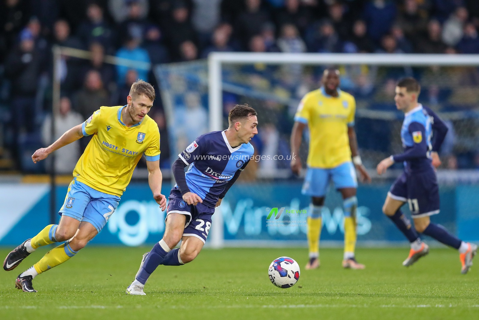 Josh Scowen #28 of Wycombe Wanderers runs with the ball during the Sky Bet League 1 match Wycombe Wanderers vs Sheffield Wednesday at Adams Park, High Wycombe, United Kingdom, 14th January 2023

(Photo by Gareth Evans/News Images)