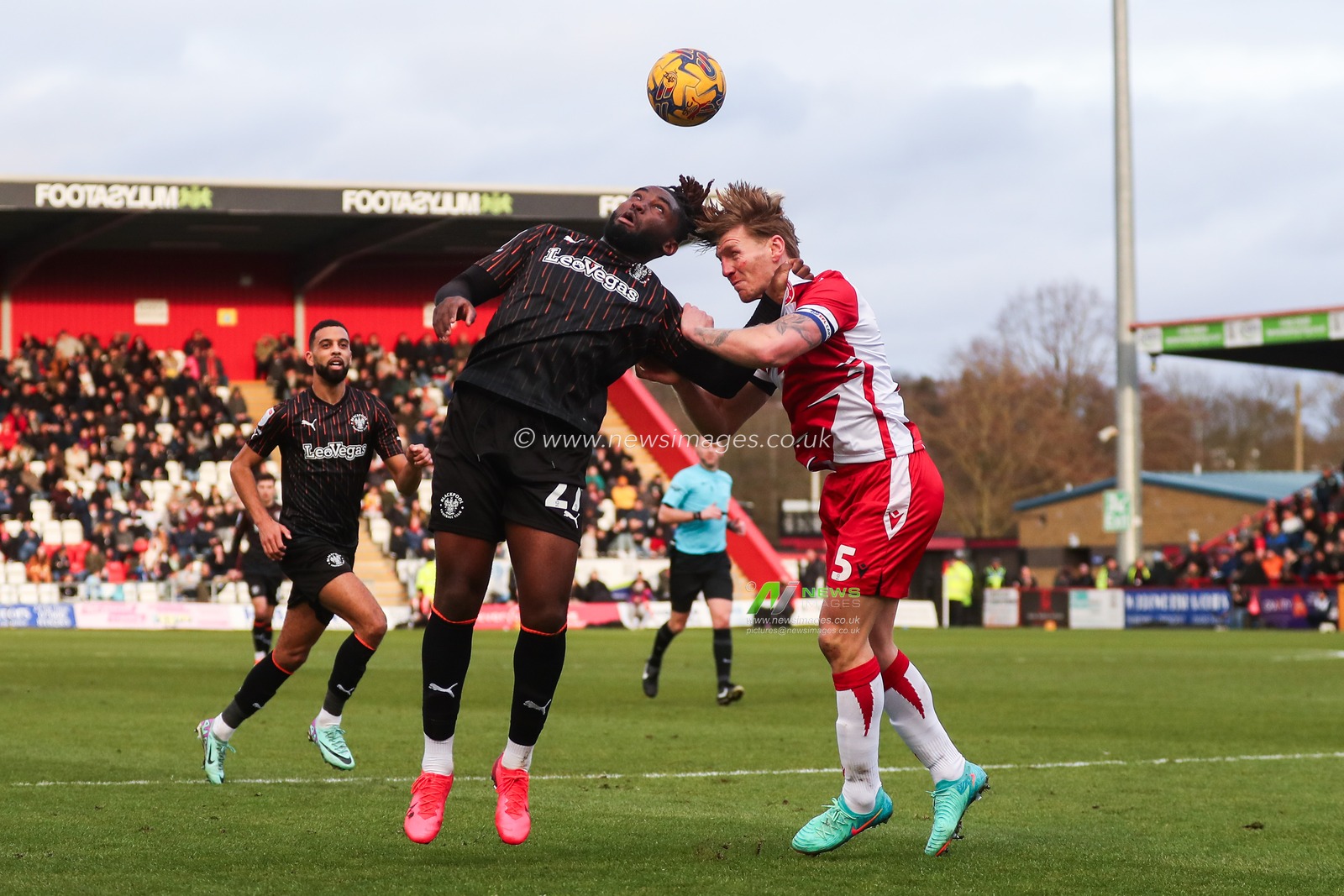 Kylian Kouassi of Blackpool and Carl Piergianni of Stevenage battle for the ball during the Sky Bet League 1 match Stevenage vs Blackpool at Lamex Stadium, Stevenage, United Kingdom, 3rd February 2024

(Photo by Gareth Evans/News Images)