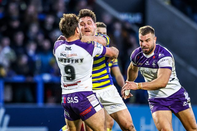 Liam Byrne of Warrington Wolves is tackled by Tyson Smoothy of Wakefield Trinity during the Betfred Super League Round 3 match Warrington Wolves vs Wakefield Trinity at The Halliwell Jones Stadium, Warrington, United Kingdom on 28 February 2026

(Photo by Alfie Cosgrove/News Images)