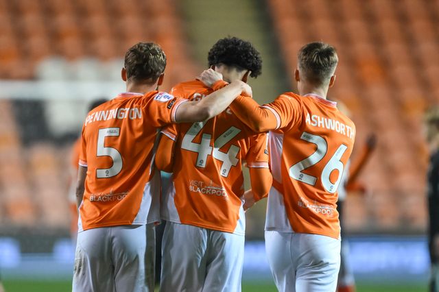 Takudzwa Gwanzura of Blackpool is consoled by Matt Pennington of Blackpool and Zac Ashworth of Blackpool after his missed his penalty during the Bristol Street Motors Trophy match Blackpool vs Liverpool U21 at Bloomfield Road, Blackpool, United Kingdom, 6th November 2024

(Photo by Craig Thomas/News Images)