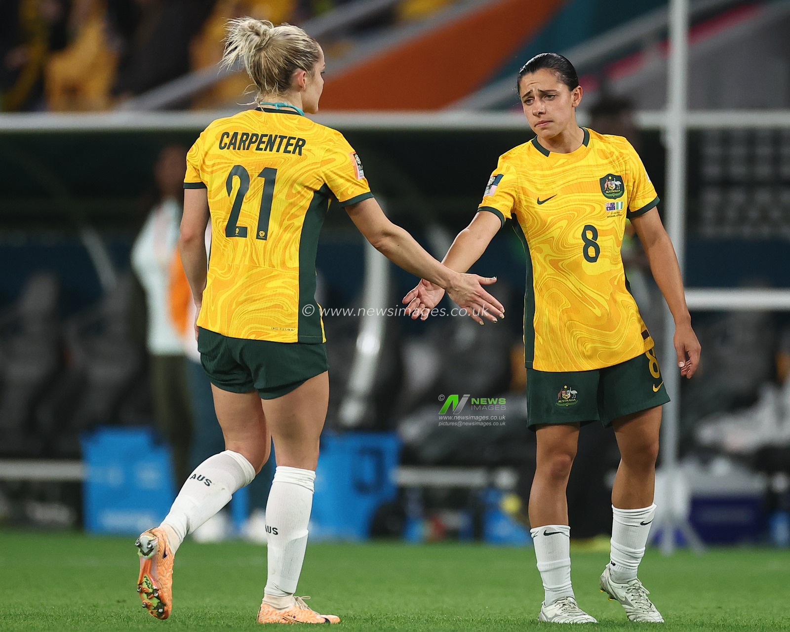 Ellie Carpenter #21 of Australia and Alex Chidiac #8 of Australia shake hands after the game during the FIFA Women's World Cup 2023 Group B match Australia Women vs Nigeria Women at Suncorp Stadium, Brisbane, Australia, 27th July 2023

(Photo by Patrick Hoelscher/News Images)