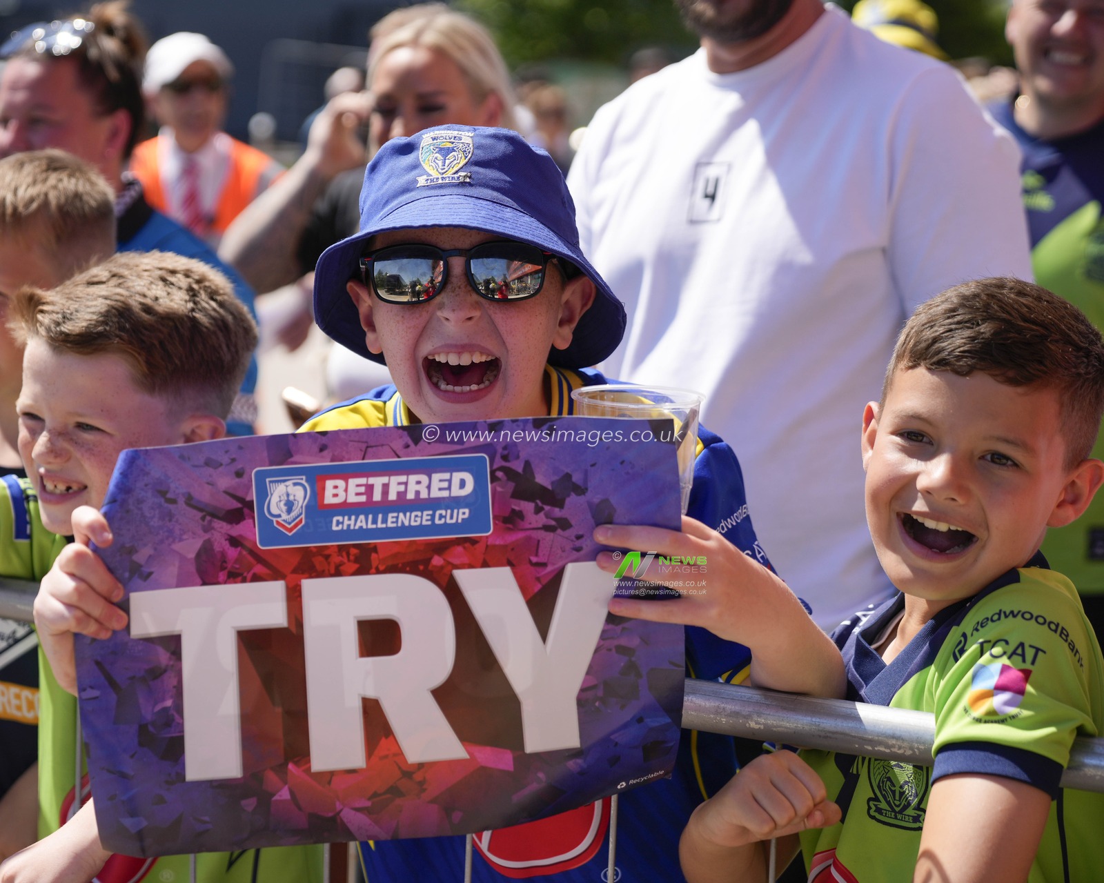 Young Warrington Wolves fan await their team arrival before the Betfred Challenge Cup Semi-Final match Huddersfield Giants vs Warrington Wolves at Totally Wicked Stadium, St Helens, United Kingdom, 19th May 2024

(Photo by Steve Flynn/News Images)