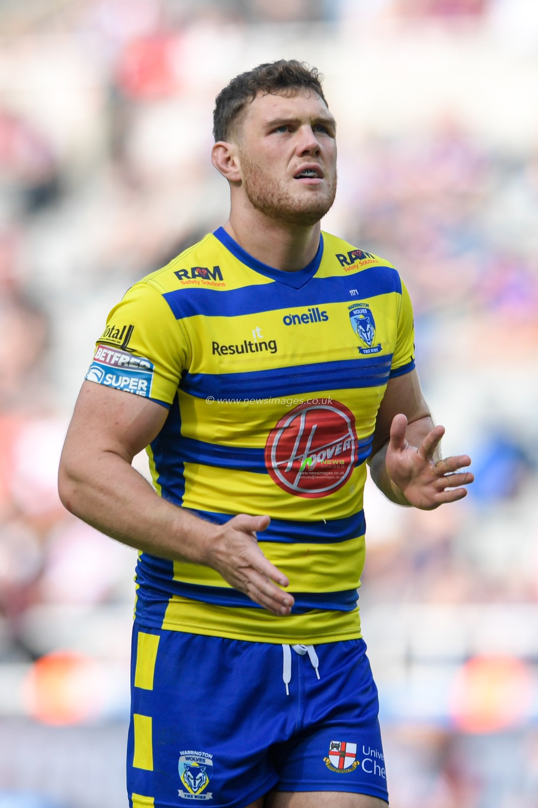 Rob Mulhern (19) of Warrington Wolves in action during the game