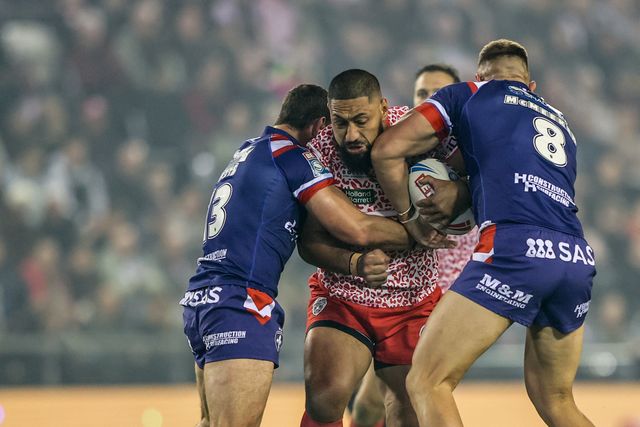 Isaac Liu of Leigh Leopards is tackled by Jay Pitts of Wakefield Trinity and Mike McMeeken of Wakefield Trinity during the Betfred Super League play-off Eliminator 1 match Leigh Leopards vs Wakefield Trinity at Progress With Unity Stadium, Leigh, United Kingdom, 26th September 2025

(Photo by Alfie Cosgrove/News Images)