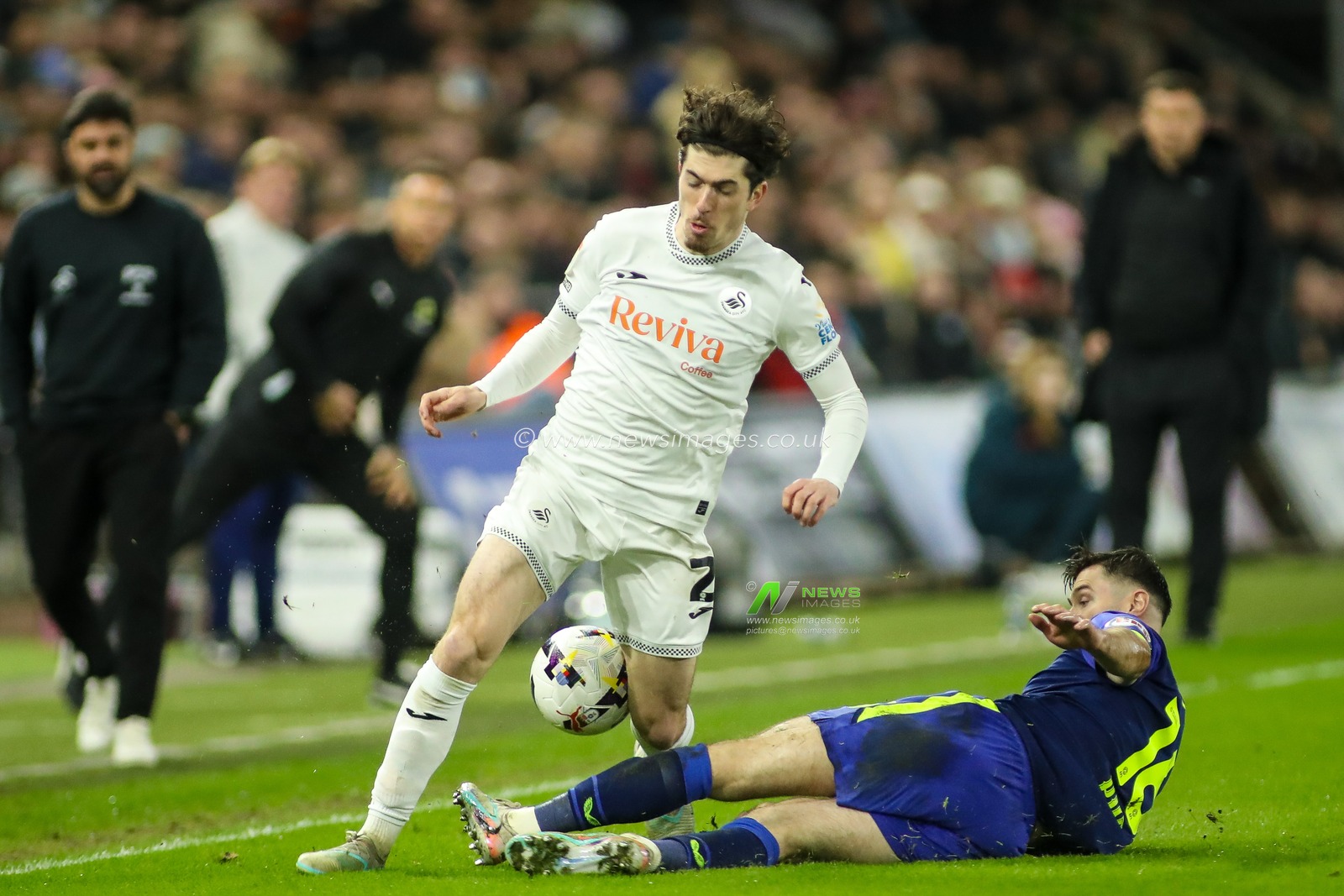 Josh Key of Swansea City is tackled by Andrew Hughes of Preston North End during the Sky Bet Championship match Swansea City vs Preston North End at Swansea.com Stadium, Swansea, United Kingdom on 24 February 2026

(Photo by Andrew Lewis/News Images)