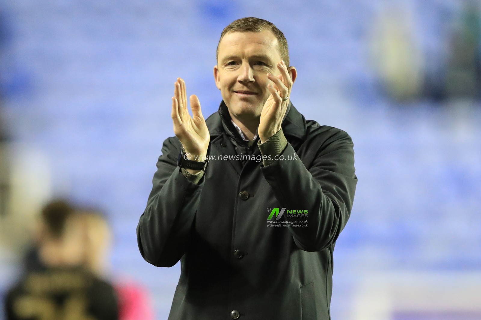 Neill Collins Head coach of Barnsley applauds the travelling fans after a 1-3 win during the Sky Bet League 1 match Reading vs Barnsley at Select Car Leasing Stadium, Reading, United Kingdom, 9th December 2023

(Photo by Alfie Cosgrove/News Images)