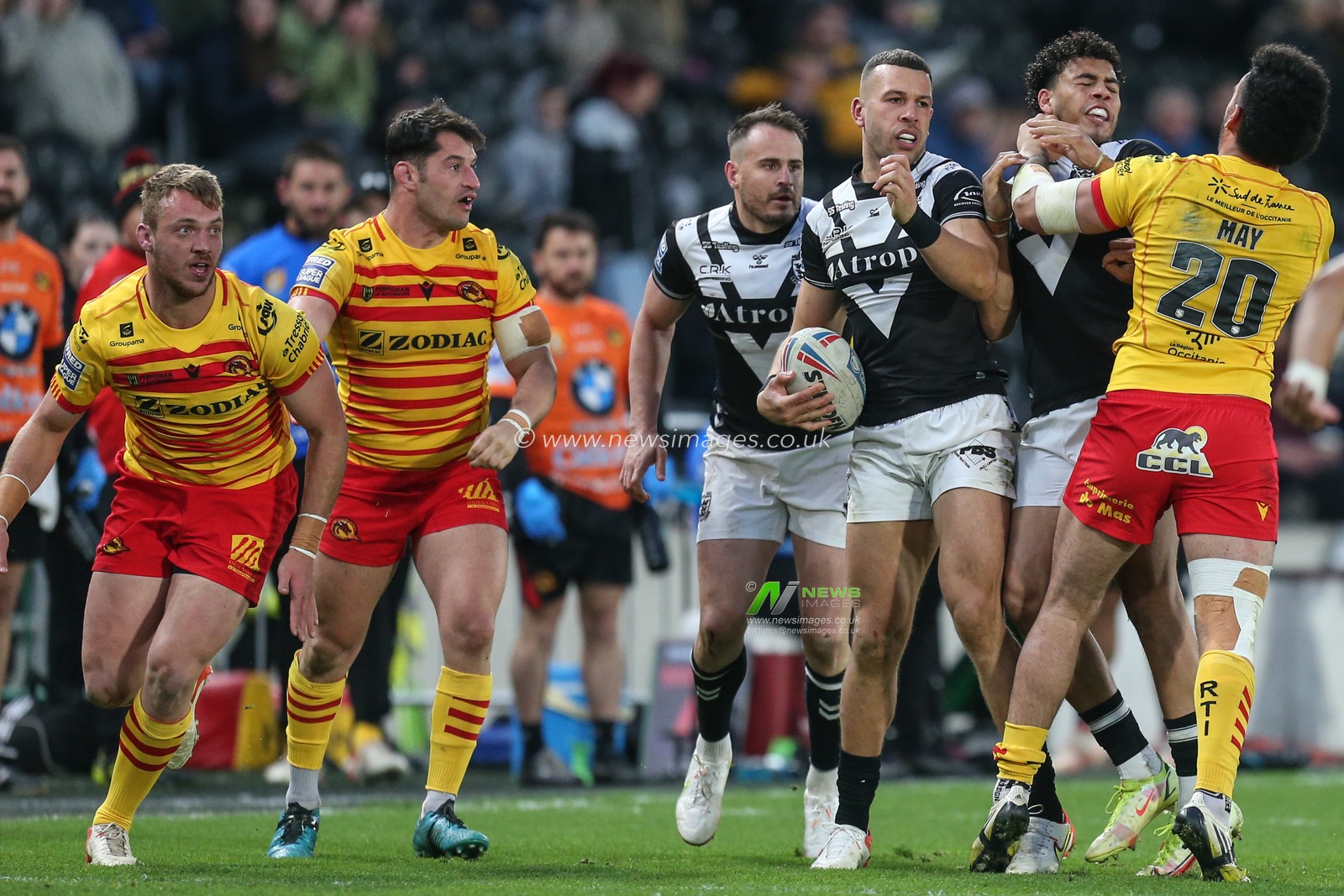 Tempers flare up between Darnell McIntosh #5 of Hull FC and Tyrone May #20 of Catalans Dragons