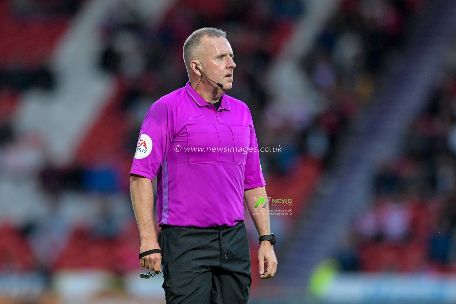 Referee Jonathan Moss in action during the game