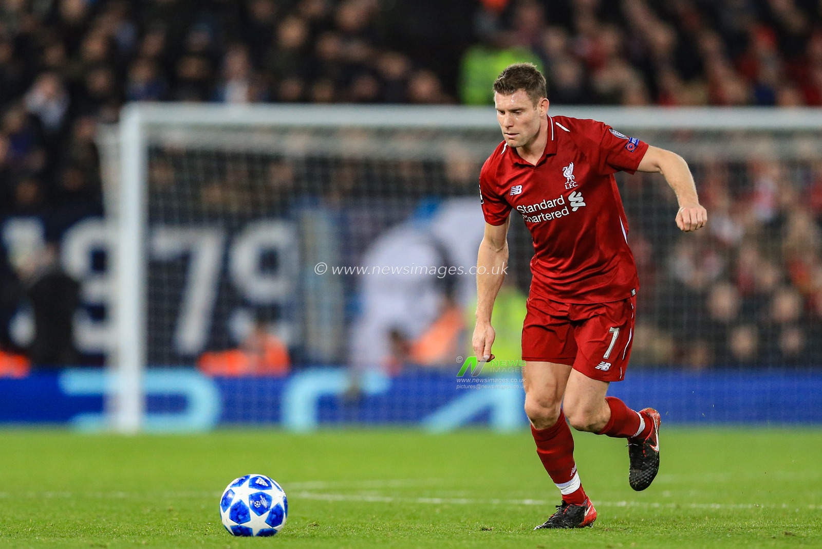 11th December 2018, Anfield, Liverpool, England; UEFA Champions League, Liverpool v Napoli ; James Milner (07) of Liverpool with the ball 


  Credit: Mark Cosgrove/News Images