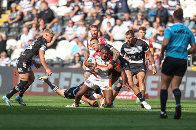 Jordan Dezaria of Catalan Dragons is tackled by Danny Houghton of Hull FC and Carlos Tuimavave of Hull FC during the Betfred Super League Round 27 match Hull FC vs Catalans Dragons at MKM Stadium, Hull, United Kingdom, 21st September 2024

(Photo by Alfie Cosgrove/News Images)