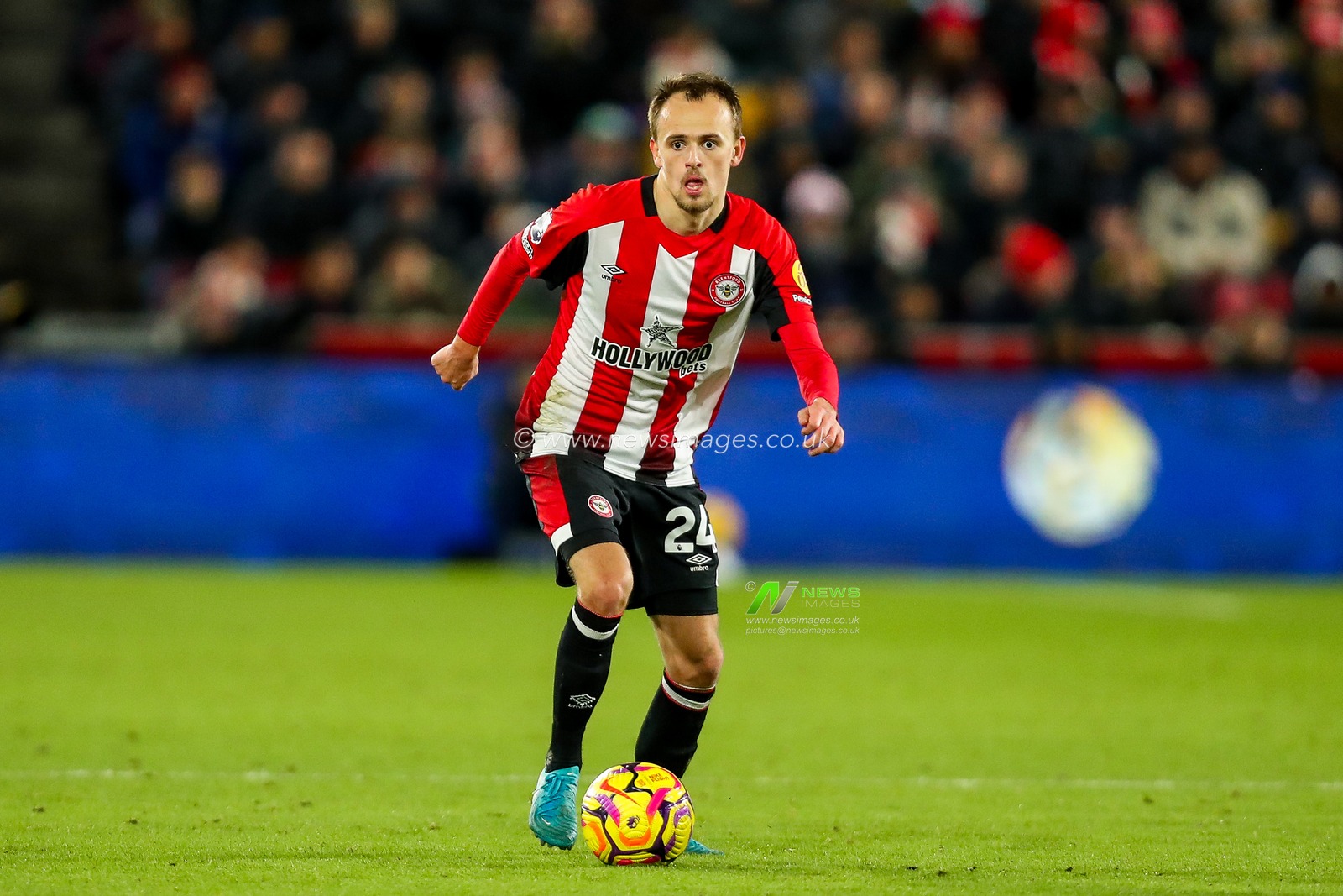 Mikkel Damsgaard of Brentford runs with the ball during the Premier League match Brentford vs Arsenal at The Gtech Community Stadium, London, United Kingdom, 1st January 2025

(Photo by Izzy Poles/News Images)