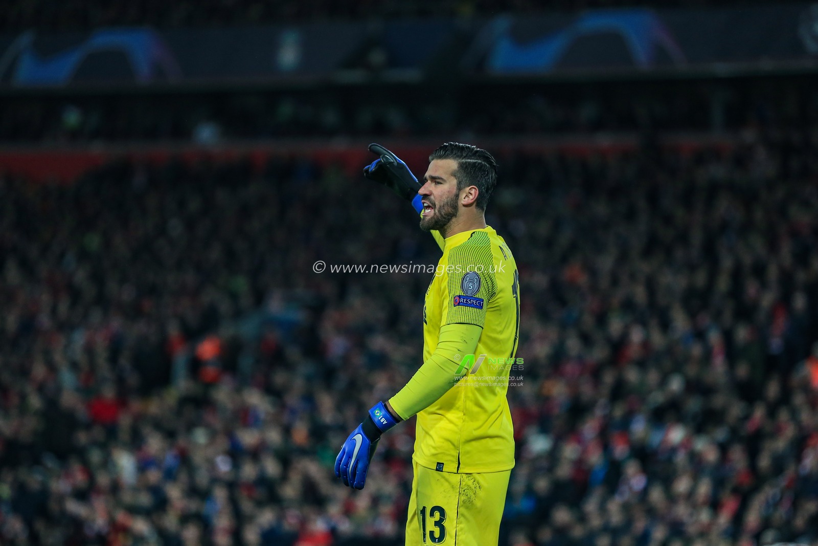 11th December 2018, Anfield, Liverpool, England; UEFA Champions League, Liverpool v Napoli ; Alisson Becker (13) of Liverpool tells his team mates to push up 


  Credit: Mark Cosgrove/News Images