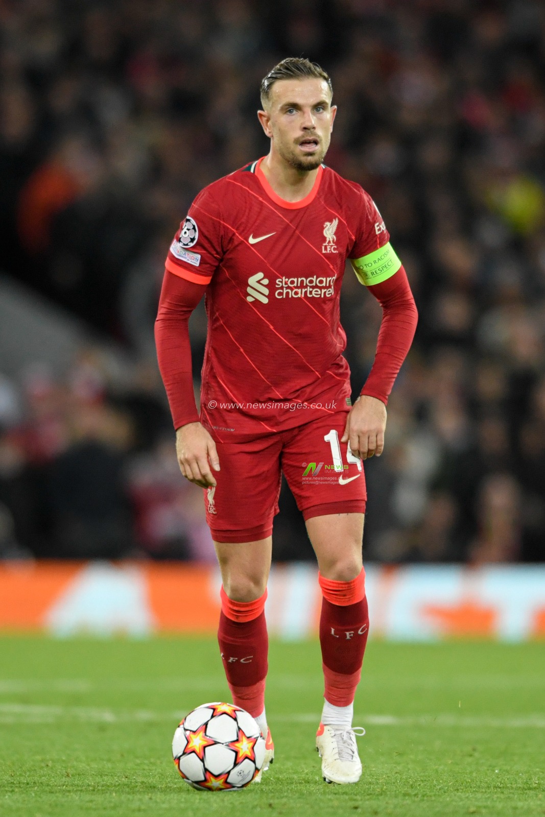 Jordan Henderson #14 of Liverpool with the ball