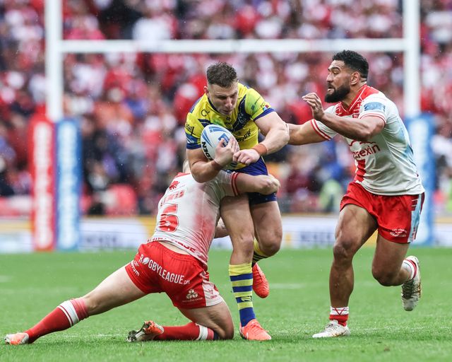 George Williams of Warrington Wolves is tackled by Mikey Lewis of Hull KR during the Betfred Challenge Cup Final Warrington Wolves vs Hull KR at Wembley Stadium, London, United Kingdom, 7th June 2025

(Photo by Mark Cosgrove/News Images)