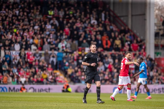 Referee Simon Mather during the Sky Bet League 1 match Wrexham vs Stockport County at SToK Cae Ras, Wrexham, United Kingdom, 22nd March 2025

(Photo by Nik Mesney/News Images)