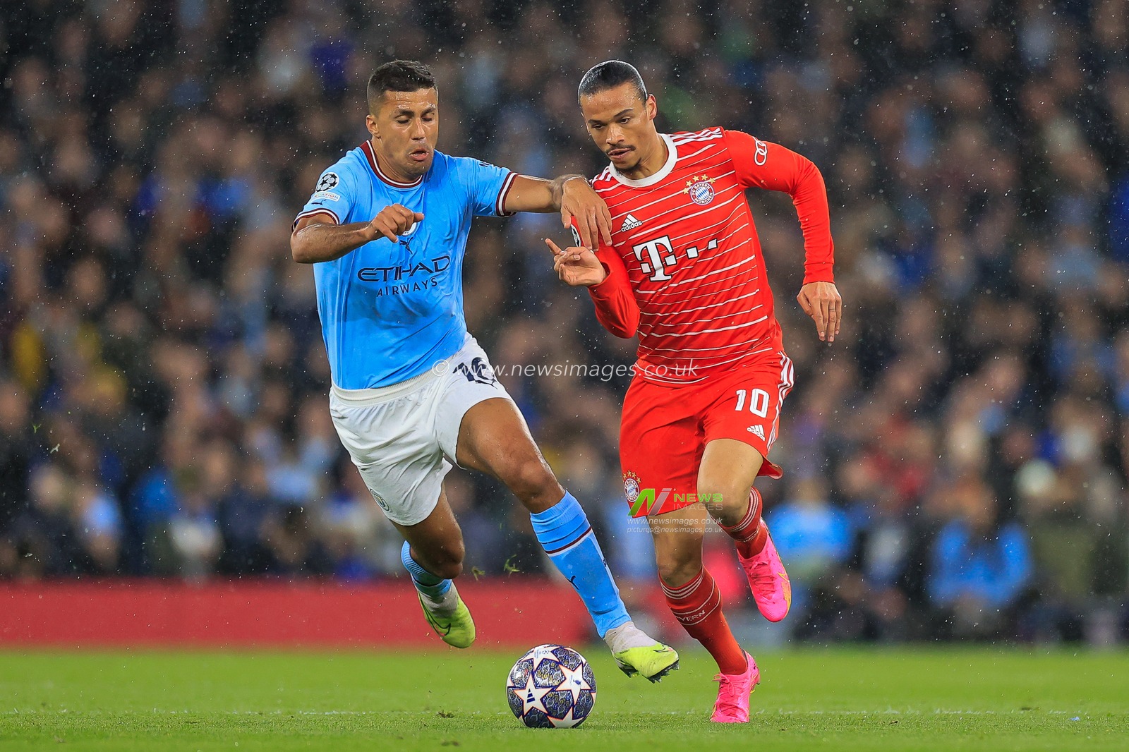 Leroy SanÃ© #10 of Bayern Munich holds off Rodri #16 of Manchester City  during the UEFA Champions League Quarter-Finals 1st Leg Manchester City vs Bayern Munich at Etihad Stadium, Manchester, United Kingdom, 11th April 2023

(Photo by Conor Molloy/News Images)