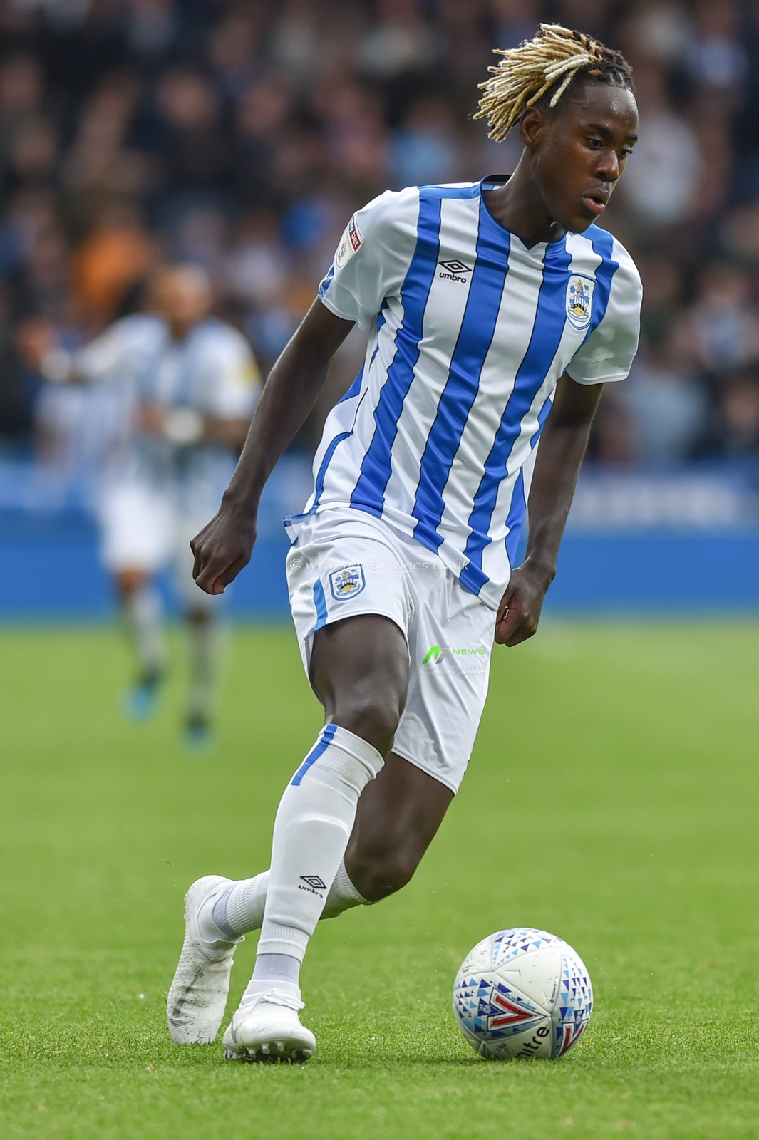 5th October 2019, John Smith's Stadium, Huddersfield, England; Sky Bet Championship, Huddersfield Town v Hull City :Trevor Chalabah (8) of Huddersfield Town runs with the ball.
Credit: Dean Williams/News Images