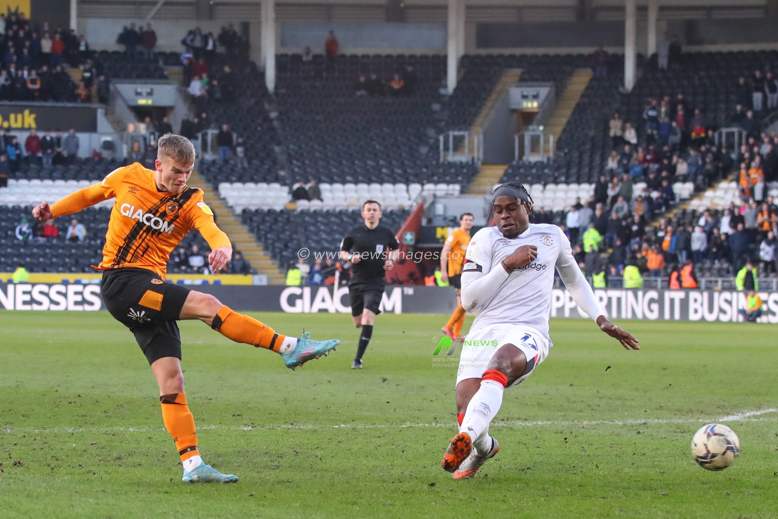 Marcus Forss #44 of Hull City takes a shot on goal which is finished by Tom Eaves #9 of Hull City