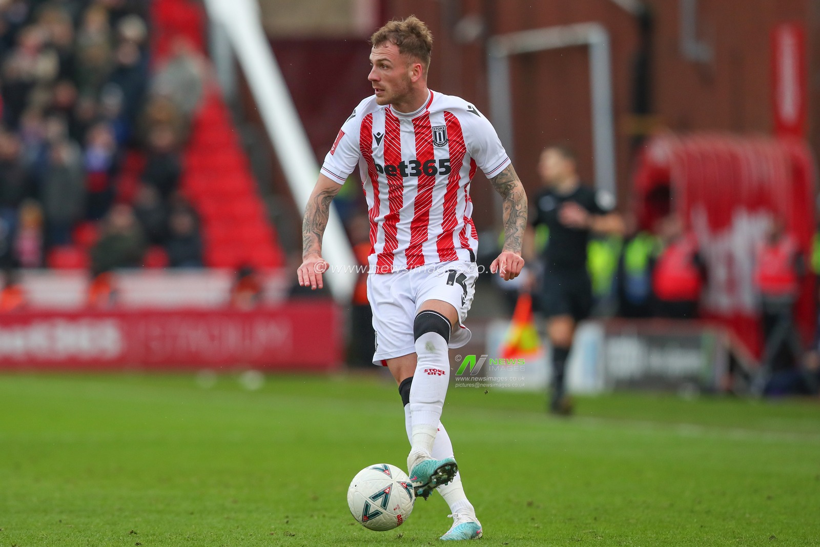 Josh Tymon #14 of Stoke City controls the ball during the Emirates FA Cup fourth round match Stoke City vs Stevenage at Bet365 Stadium, Stoke-on-Trent, United Kingdom, 29th January 2023

(Photo by Gareth Evans/News Images)