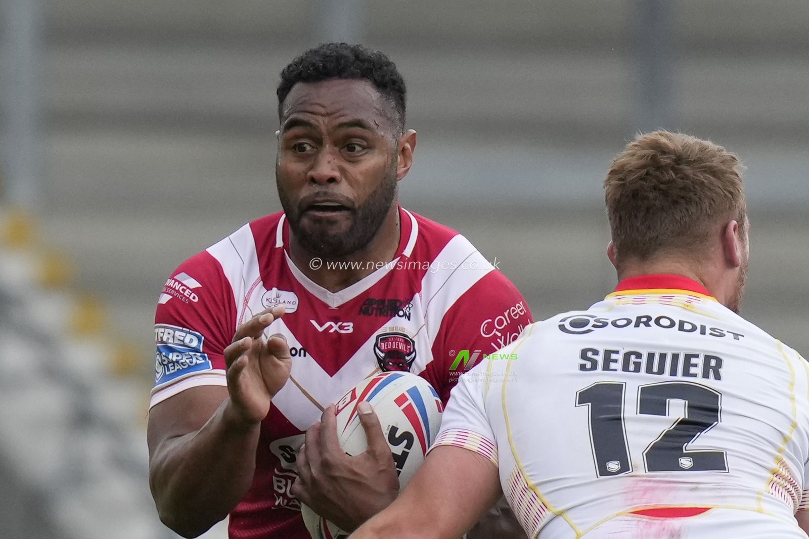 King Vuniyaywa #10 of Salford Red Devils runs at Paul Seguier #12 of Catalans Dragons during the Betfred Super League Round 10 match Salford Red Devils vs Catalans Dragons at AJ Bell Stadium, Eccles, United Kingdom, 23rd April 2023

(Photo by Steve Flynn/News Images)