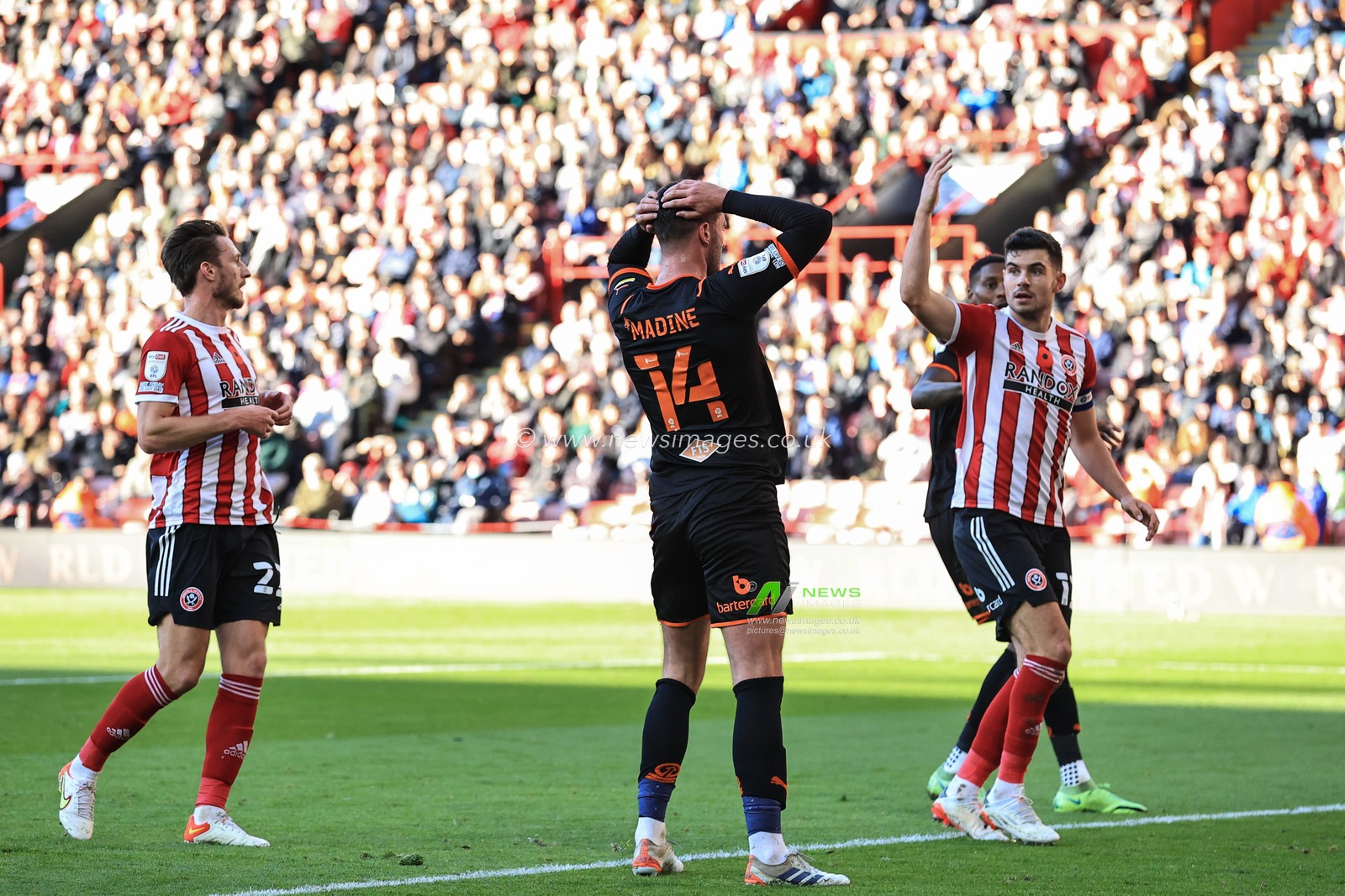 Gary Madine #14 of Blackpool reacts after missing a chance at close range