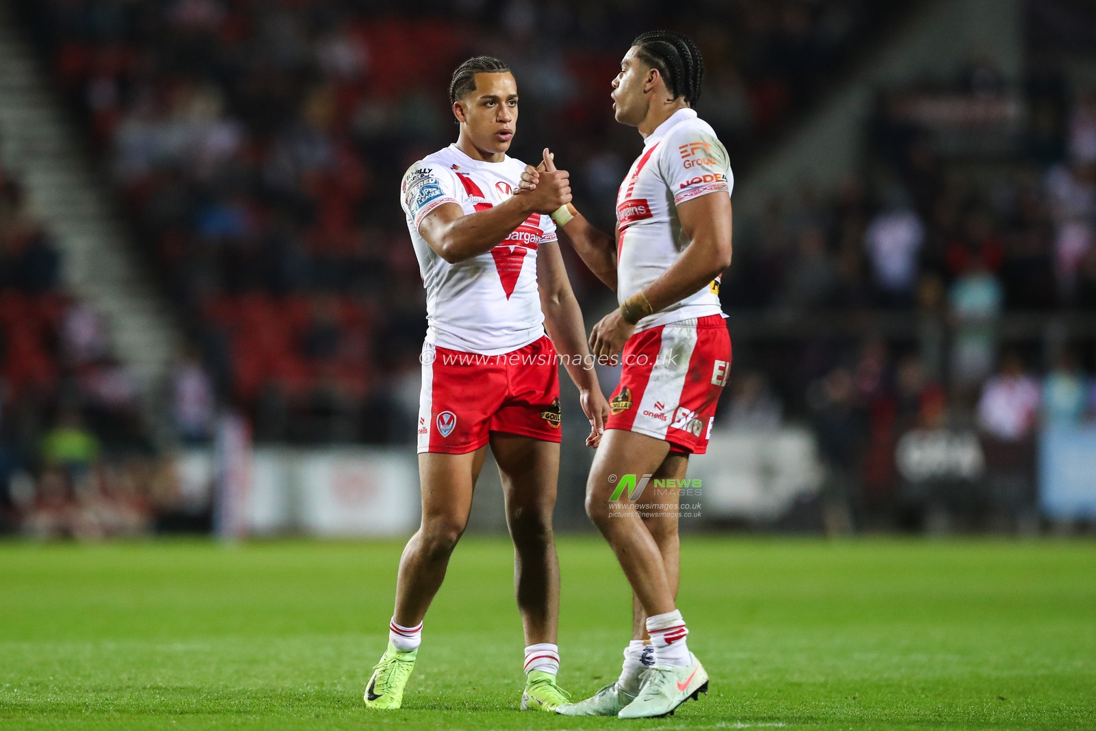 Dayon Sambou of St. Helens and Lewis Murphy of St. Helens during the Betfred Super League  Round 7 match St Helens vs Wakefield Trinity at Totally Wicked Stadium, St Helens, United Kingdom, 11th April 2025

(Photo by Gareth Evans/News Images)