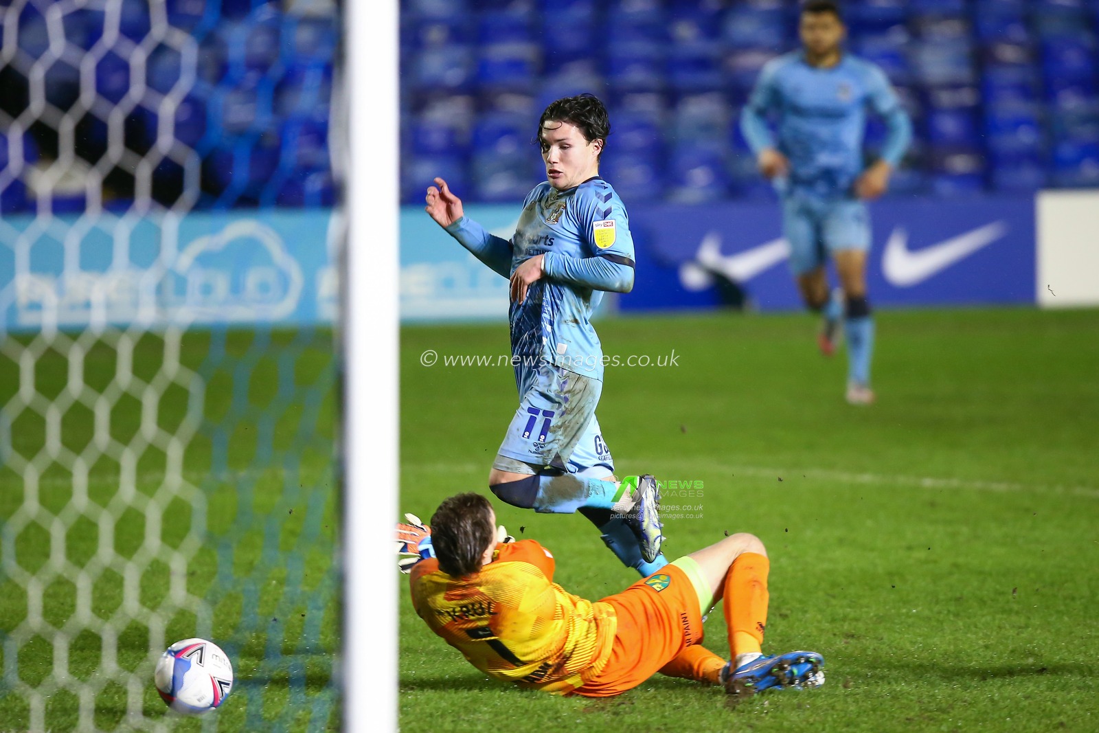 Callum OHare #11 of Coventry City has his shot saved by Tim Krul #1 of Norwich City
