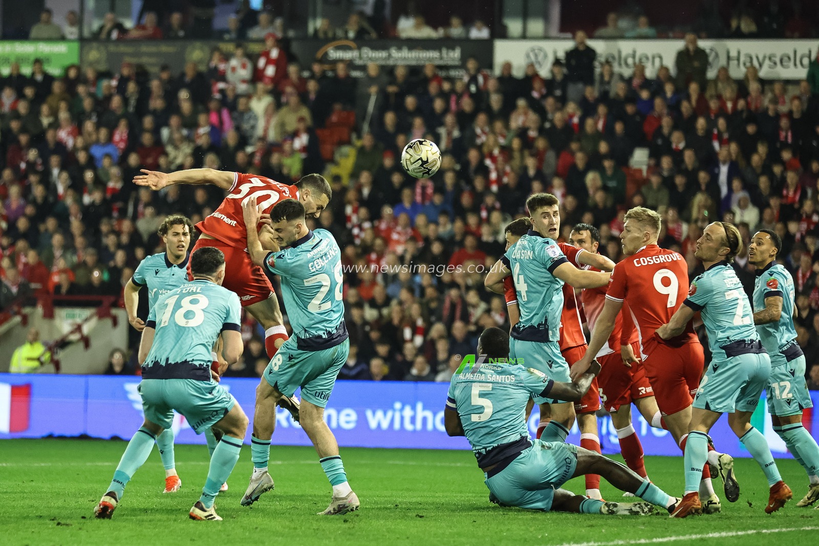 Adam Phillips of Barnsley heads on goal during the Sky Bet League 1 Promotion Play-offs Semi-final first leg match Barnsley vs Bolton Wanderers at Oakwell, Barnsley, United Kingdom, 3rd May 2024

(Photo by Mark Cosgrove/News Images)