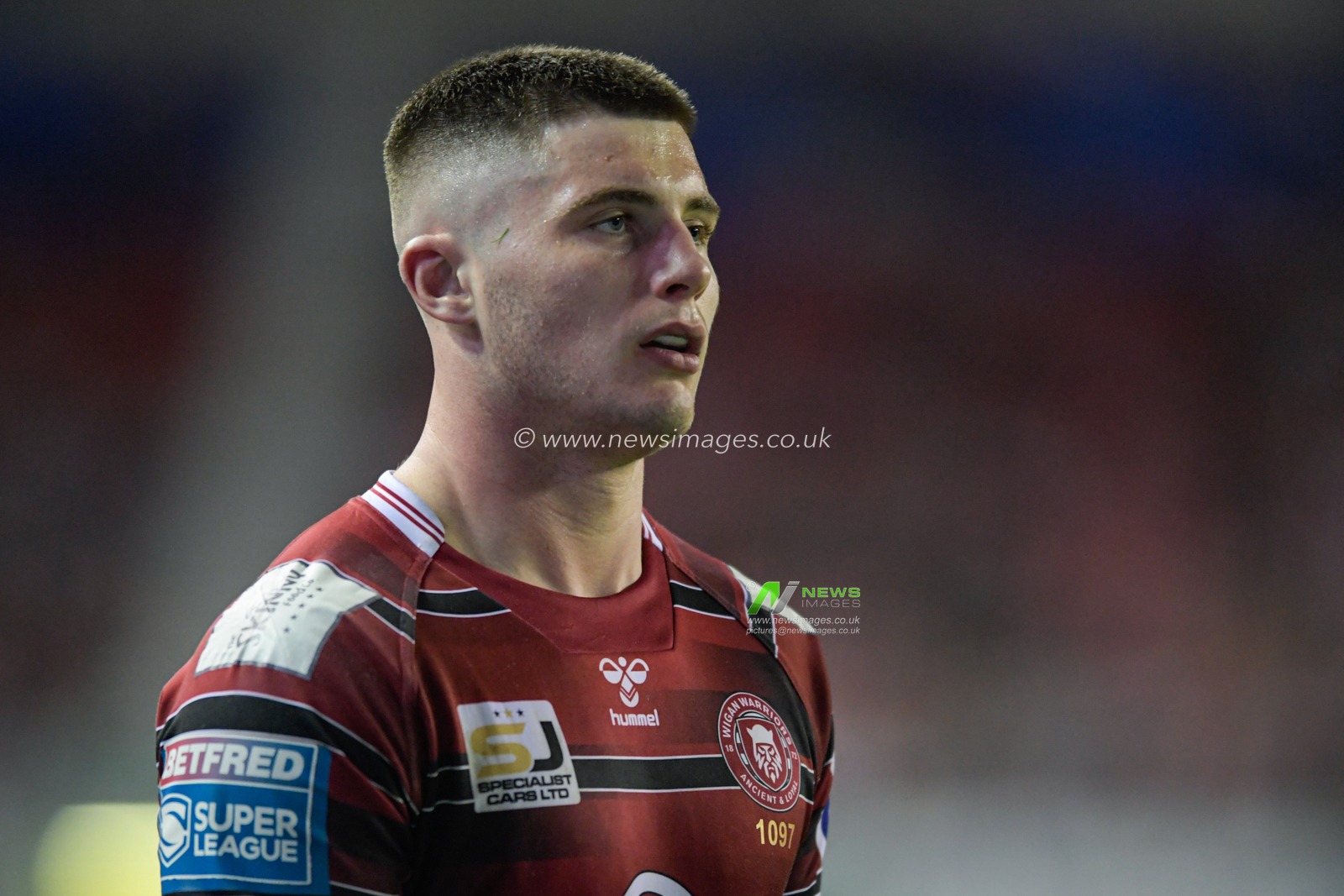 Ethan Havard (21) of Wigan Warriors in action during the game