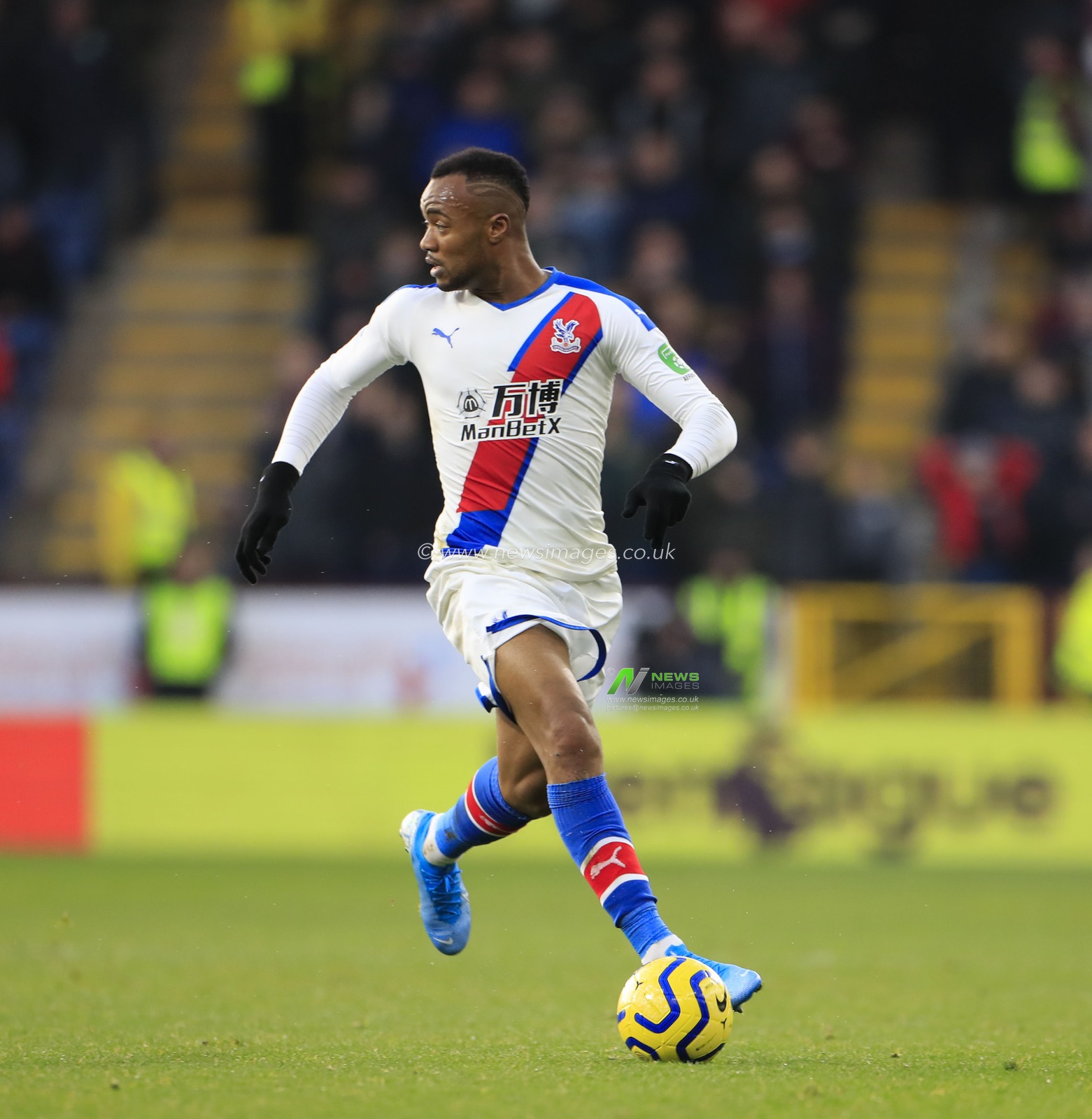 30th November 2019, Turf Moor, Burnley, England; Premier League, Burnley v Crystal Palace : Jordan Ayew (9) of Crystal Palace runs with the ball

Credit: Conor Molloy/News Images