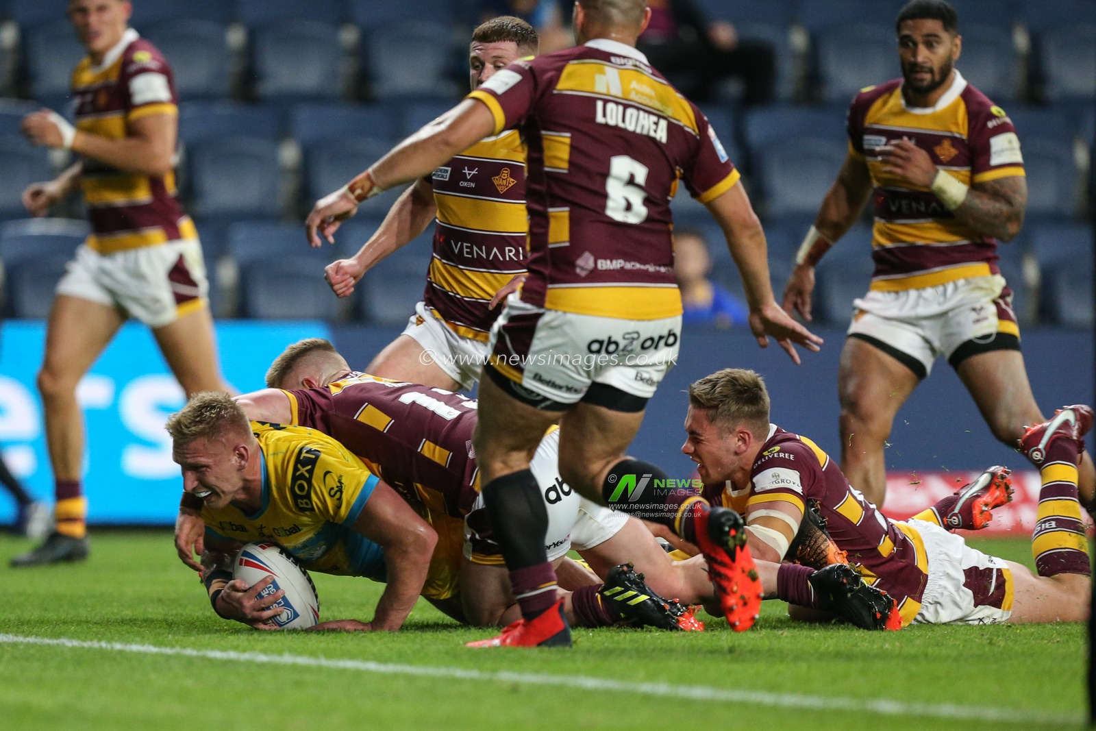 Mikolaj Oledzki #8 of Leeds Rhinos looks to stretch for the try line