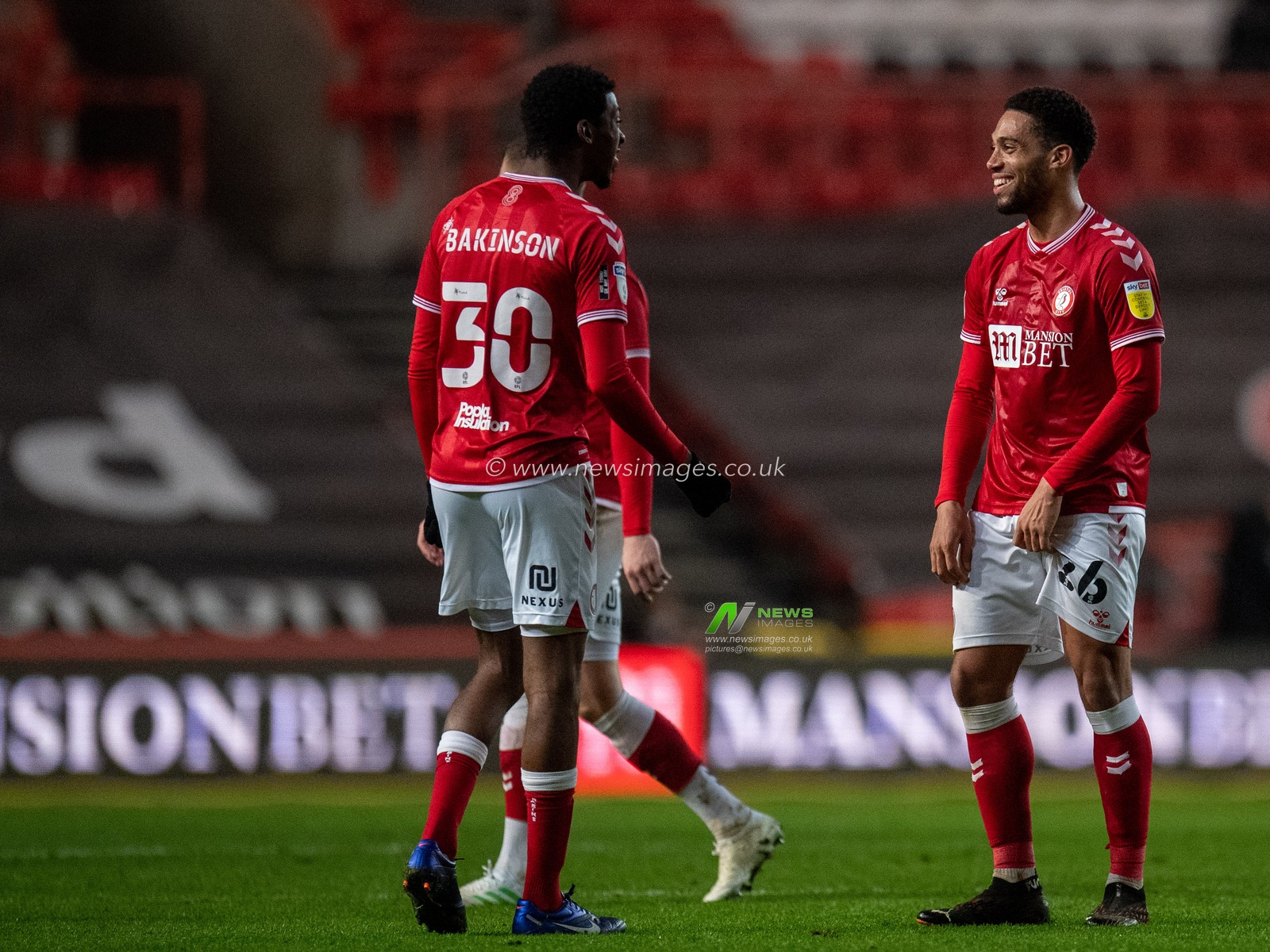 Zak Vyner #26 of Bristol City celebrates with his team mates, at a distance....